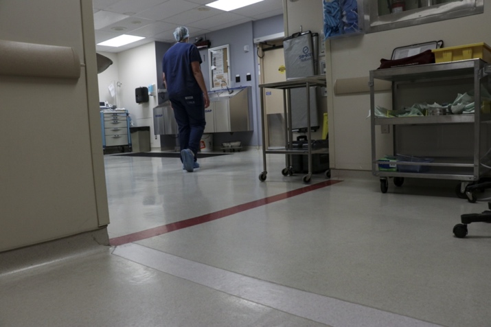 A person walking in a room

Description automatically generated with low confidence