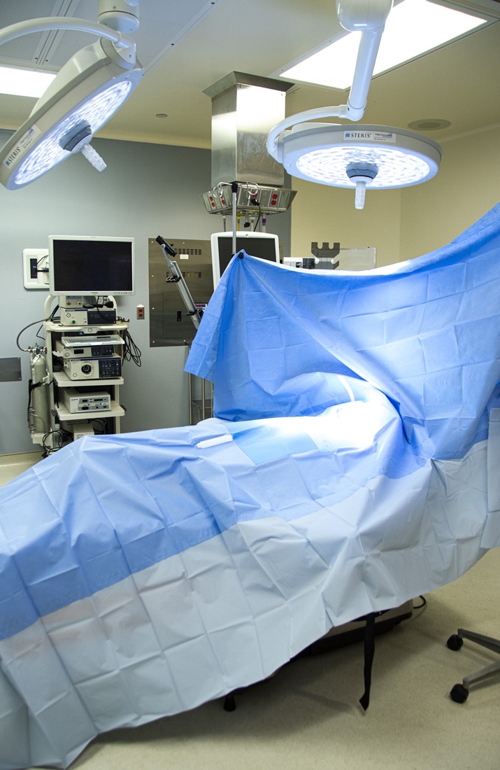 A picture containing indoor, wall, bed, floor
Description automatically generated